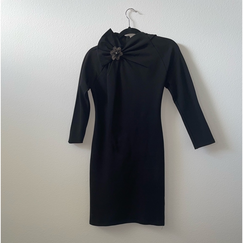 Black knee length long sleeves with flower brooch